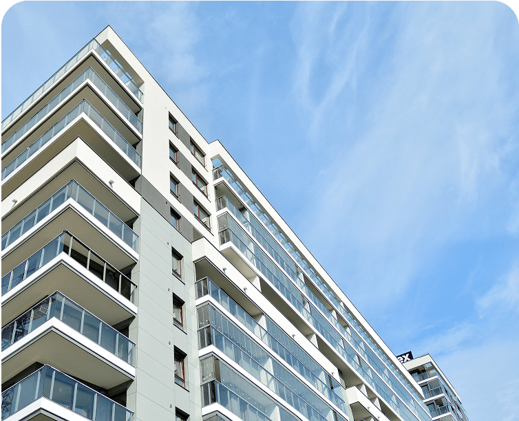 Modern apartment building against blue sky.