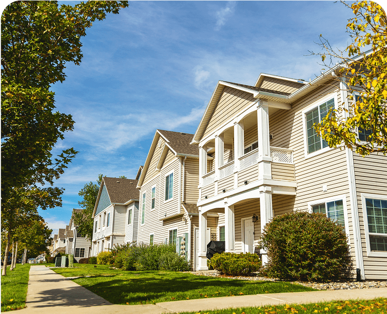 Suburban houses with a clear blue sky.